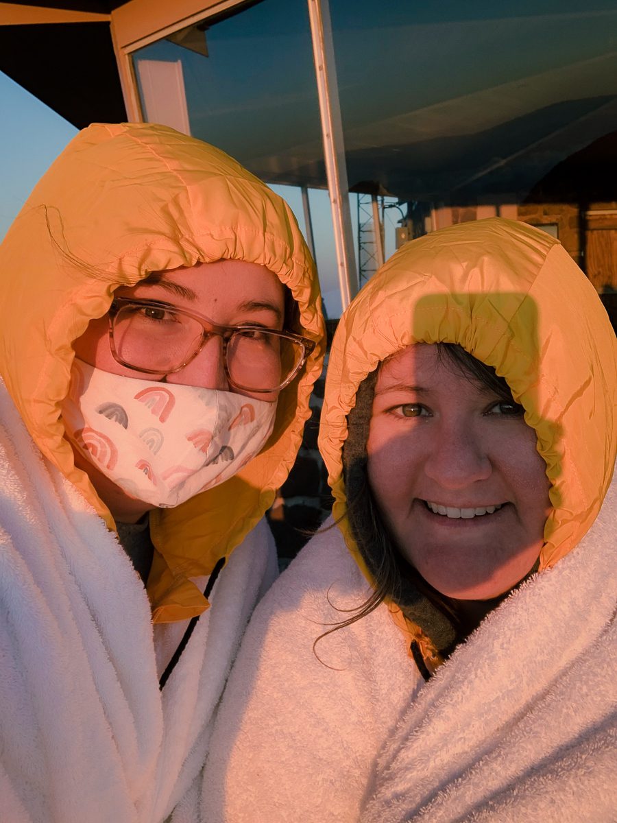 Two women bundled up