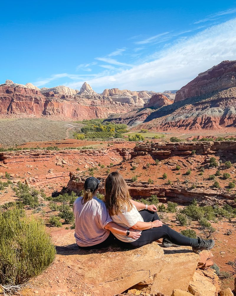 two women overlooking capitol reef